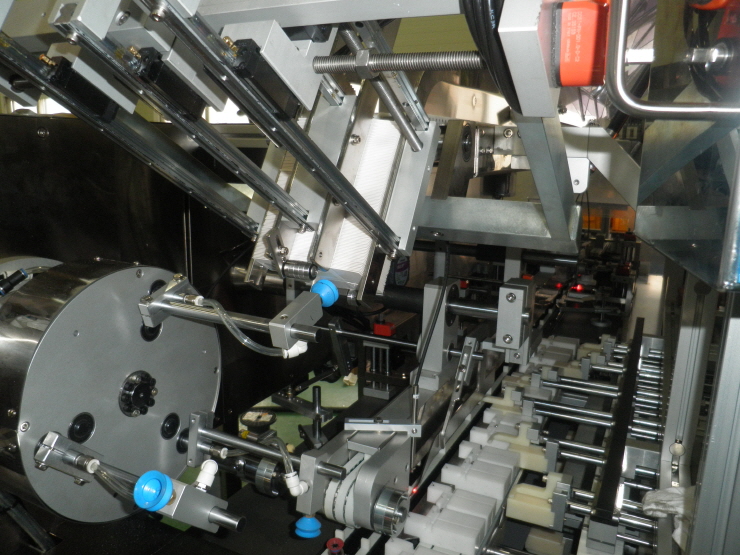 Drum device for kp200 carton supply